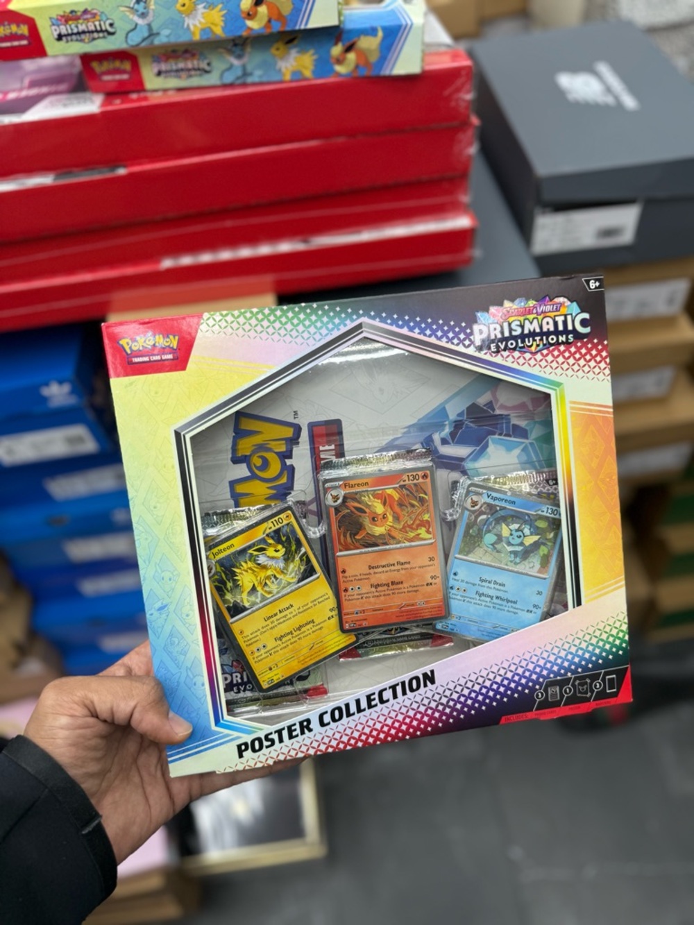 Pokémon Prismatic Evolutions Poster Collection - Yellow/Orange/Blue